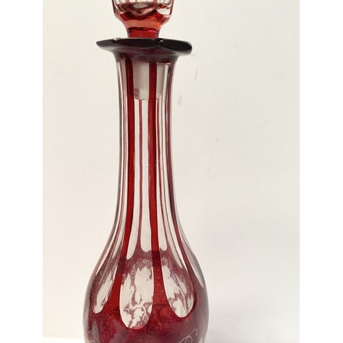 224 - A COLLECTION OF VINTAGE RUBY GLASS, to include (i) an painted and etched glass decanter, (ii) a ruby... 