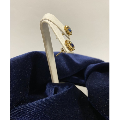 24 - A BEAUTIFUL PAIR OF SAPPHIRE & DIAMOND CLUSTER STUD EARRINGS, with central oval cut vibrant sapphire... 