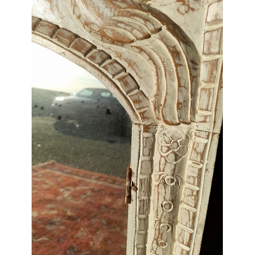 252 - A BEAUTIFUL HAND CARVED RECLAIMED WOOD MIRROR, mirror of rectangular form with arched top, the frame... 