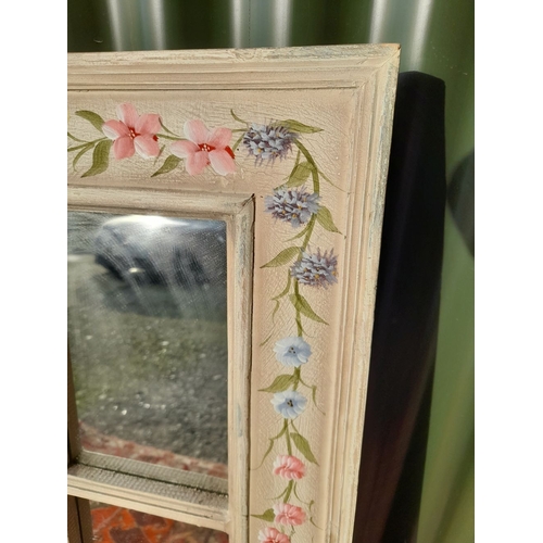 253 - A DECORATIVE HAND PAINTED SIX PANEL MIRROR, with floral border. Dimensions: 88cm high x 49cm wide ap... 