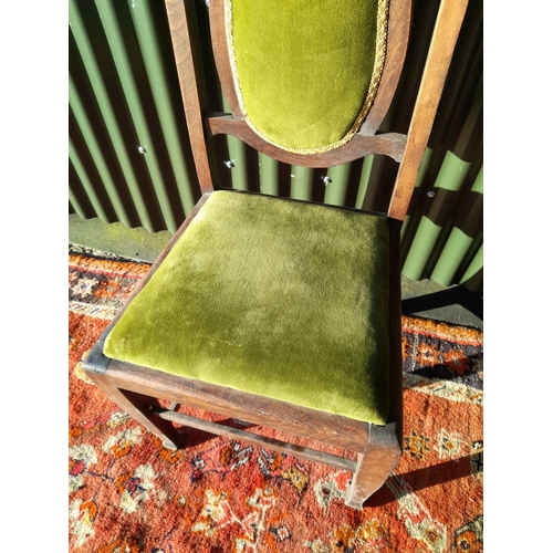 254 - AN EDWARDIAN DINING CHAIR, with carved back rail, upholstered backrest and seat, raised on tapered l... 