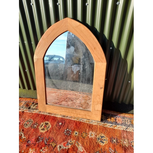 256 - A MODERN GOTHIC STYLE HARDWOOD MIRROR, arched mirror in hardwood frame. Dimensions: 96cm high x 70cm... 