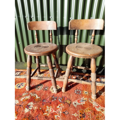 257 - A PAIR OF ANTIQUE FRENCH HARDWOOD CHILDREN'S STOOLS, backrests are raised on two carved spindles, th... 