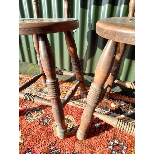 257 - A PAIR OF ANTIQUE FRENCH HARDWOOD CHILDREN'S STOOLS, backrests are raised on two carved spindles, th... 