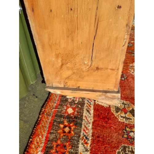 259 - A WELSH MADE ANTIQUE PINE DRESSER, with open shelves to top above base with one drawer over two door... 