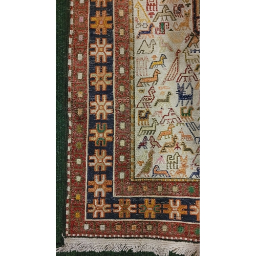 27 - A BEAUTIFUL HANDWOVEN IRANIAN KILIM FLOOR RUG, with a pair of large medallions one to each end with ... 