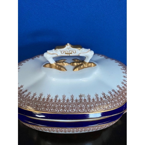 273 - A ROYAL WORCESTER VITREOUS TOUREEN, cobalt blue and gilt details, marked to base. Dimensions: 39cm x... 