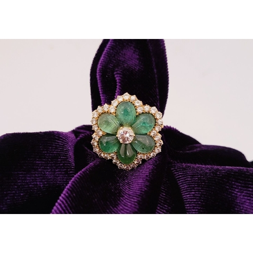 29 - AN 18CT YELLOW GOLD VINTAGE DIAMOND & EMERALD RING, the unique piece is in the form of a flower, wit... 