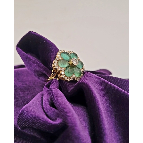 29 - AN 18CT YELLOW GOLD VINTAGE DIAMOND & EMERALD RING, the unique piece is in the form of a flower, wit... 