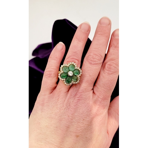 29 - AN 18CT YELLOW GOLD VINTAGE DIAMOND & EMERALD RING, the unique piece is in the form of a flower, wit... 