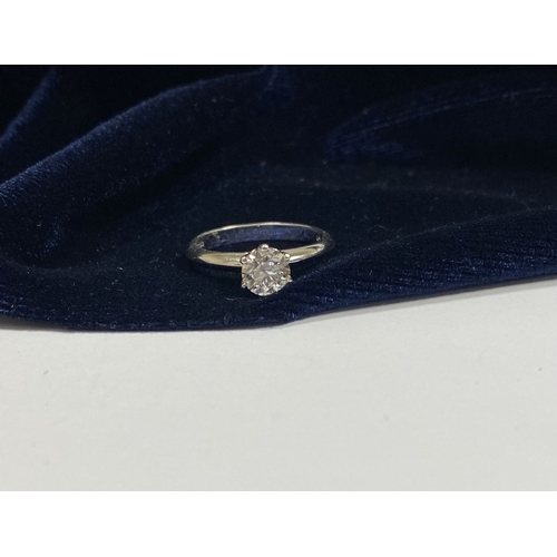 3 - AN EXCELLENT QUALITY 18CT WHITE GOLD DIAMOND SOLITAIRE RING, the round brilliant cut diamond is in a... 