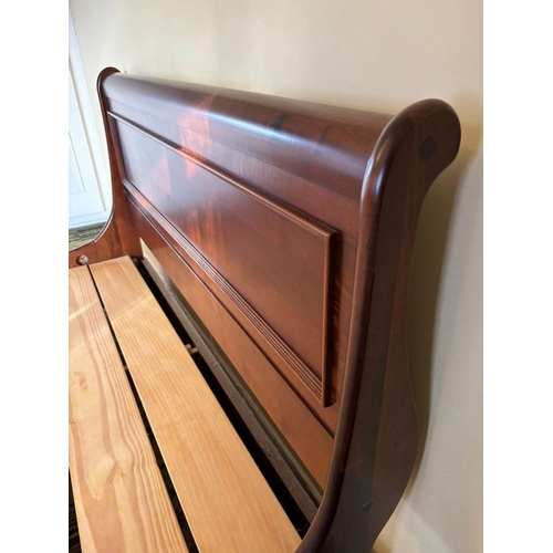 321 - AN EXCELLENT MAHOGANY SLEIGH BED, with panelling to bedframe and base, raised on bracket feet. Dimen... 