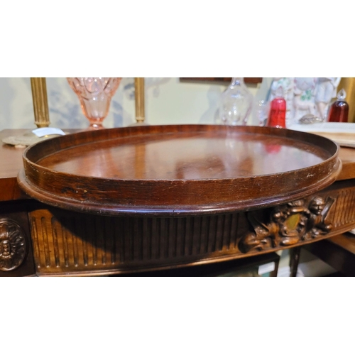 54 - A LARGE IRISH GEORGIAN QUAKER FAMILY MAHOGANY OVAL SHAPED BUTLER’S TRAY, with raised gallery edge. N... 