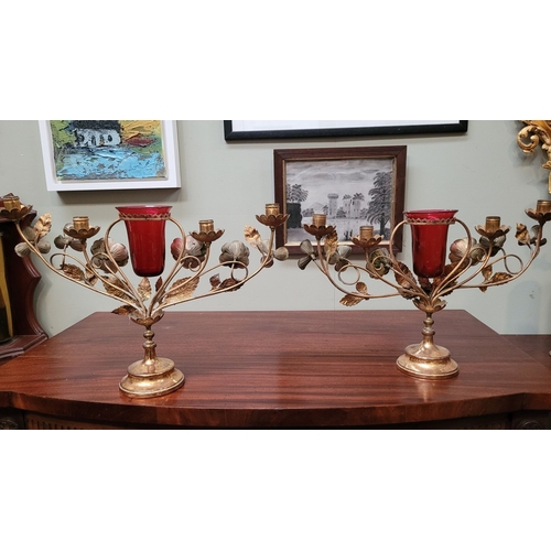 56 - A FANTASTIC PAIR OF DECORATIVE ECCLESIASTICAL STYLE GILT METAL & GEMSTONE CANDELABRA, with a central... 