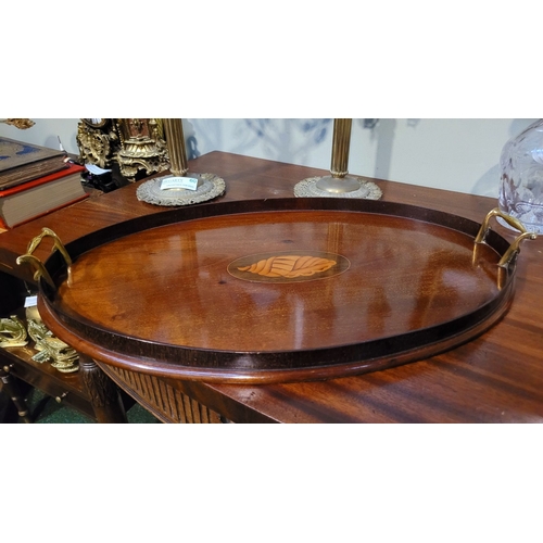 58 - A VERY GOOD 19TH CENTURY INLAID OVAL SHAPED  TRAY, with raised gallery edge having a pair of scroll ... 