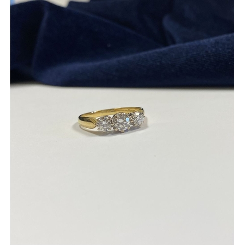 59 - A STUNNING IRISH 18CT YELLOW GOLD THREE STONE DIAMOND RING, with central round brilliant cut diamond... 