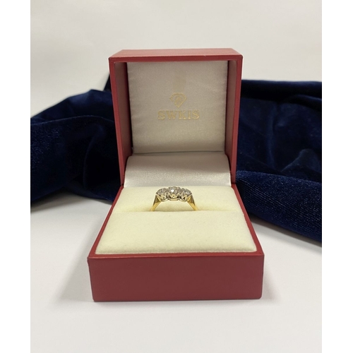 59 - A STUNNING IRISH 18CT YELLOW GOLD THREE STONE DIAMOND RING, with central round brilliant cut diamond... 