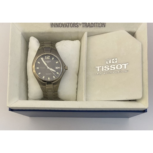 78 - A CASED TISSOT TITANIUM MENS WRISTWATCH, Quartz model, navy blue dial, model: t-sport Tissot titaniu... 