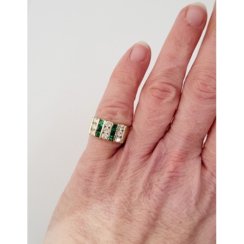 8 - A 15CT YELLOW GOLD EMERALD & DIAMOND STATEMENT RING, with the stones set in five vertical rows with ... 