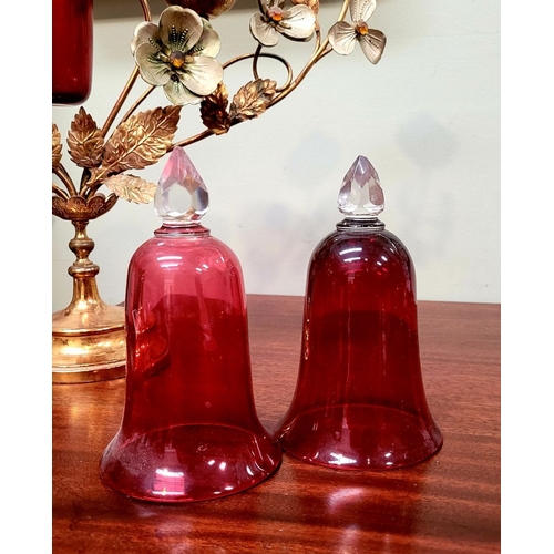 81 - TWO ANTIQUE COLLECTABLE CRANBERRY GLASS BELL ORNAMENTS / STEMLESS GLASSES, each with a cut clear gla... 