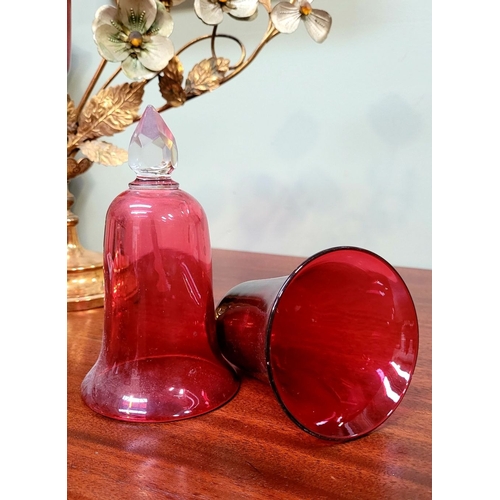 81 - TWO ANTIQUE COLLECTABLE CRANBERRY GLASS BELL ORNAMENTS / STEMLESS GLASSES, each with a cut clear gla... 