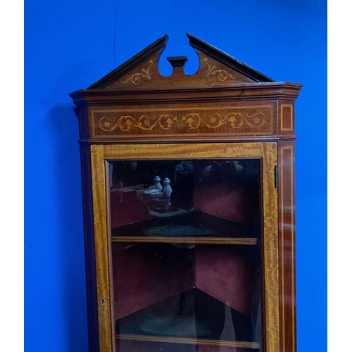 83 - AN EXCELLENT QUALITY MAHOGANY INLAID CORNER CABINET, with pediment to top, above door with glass pan... 