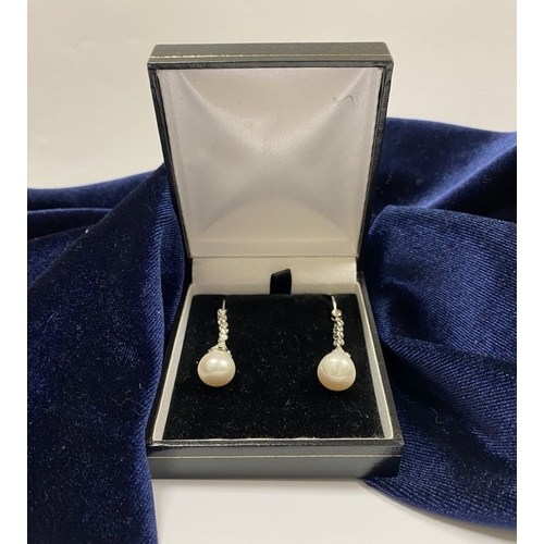 85 - AN ELEGANT PAIR OF 18CT WHITE GOLD PEARL & DIAMOND DROP EARRINGS, the pearls are set in an 18ct whit... 