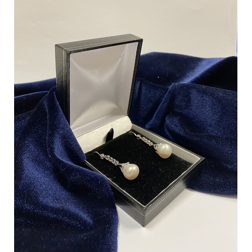 85 - AN ELEGANT PAIR OF 18CT WHITE GOLD PEARL & DIAMOND DROP EARRINGS, the pearls are set in an 18ct whit... 