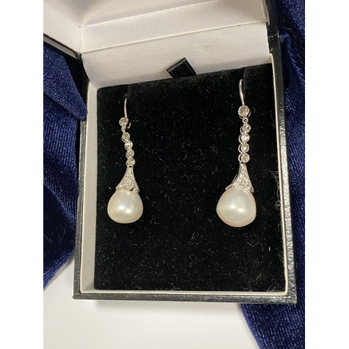 85 - AN ELEGANT PAIR OF 18CT WHITE GOLD PEARL & DIAMOND DROP EARRINGS, the pearls are set in an 18ct whit... 