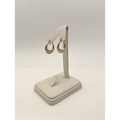 99 - A PAIR OF PRETTY 9CT GOLD HOOP EARRINGS, each hallmarked 375 to clasp, the hoops with nice engraved ... 