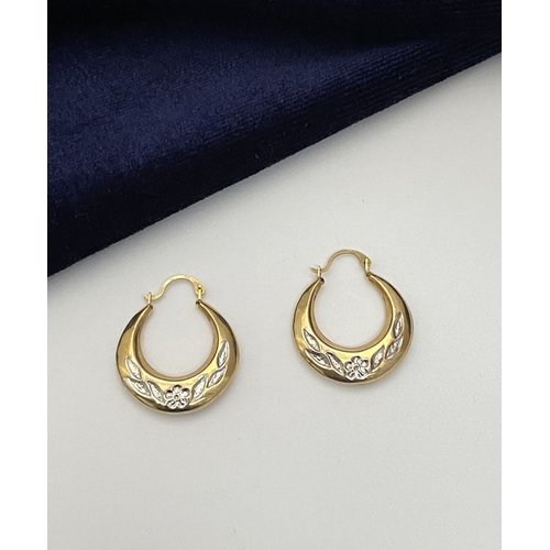 99 - A PAIR OF PRETTY 9CT GOLD HOOP EARRINGS, each hallmarked 375 to clasp, the hoops with nice engraved ... 