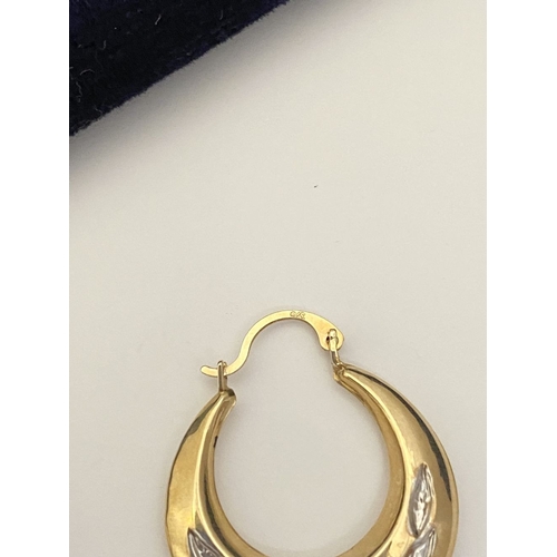 99 - A PAIR OF PRETTY 9CT GOLD HOOP EARRINGS, each hallmarked 375 to clasp, the hoops with nice engraved ... 