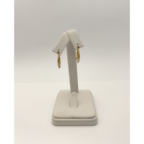 99 - A PAIR OF PRETTY 9CT GOLD HOOP EARRINGS, each hallmarked 375 to clasp, the hoops with nice engraved ... 