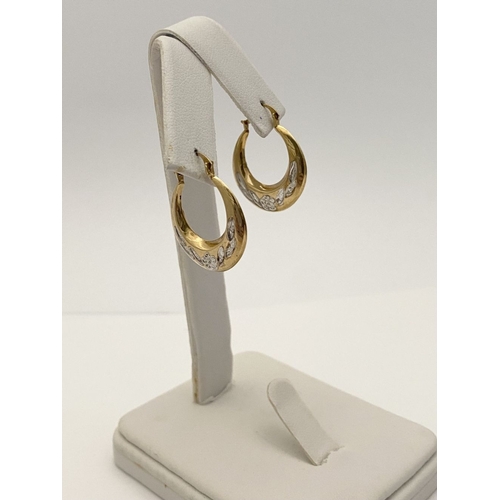 99 - A PAIR OF PRETTY 9CT GOLD HOOP EARRINGS, each hallmarked 375 to clasp, the hoops with nice engraved ... 