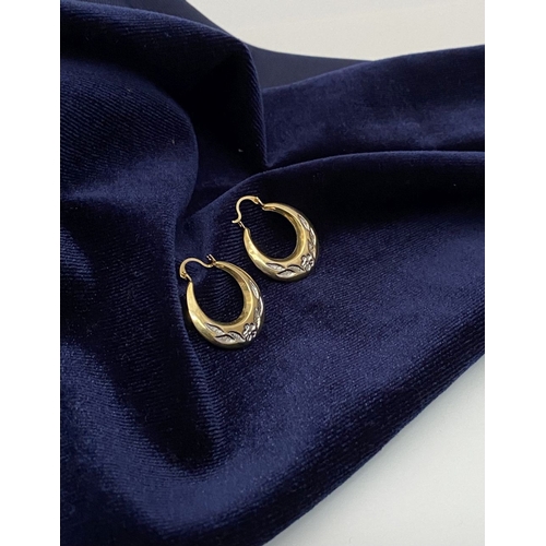 99 - A PAIR OF PRETTY 9CT GOLD HOOP EARRINGS, each hallmarked 375 to clasp, the hoops with nice engraved ... 