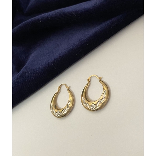 99 - A PAIR OF PRETTY 9CT GOLD HOOP EARRINGS, each hallmarked 375 to clasp, the hoops with nice engraved ... 