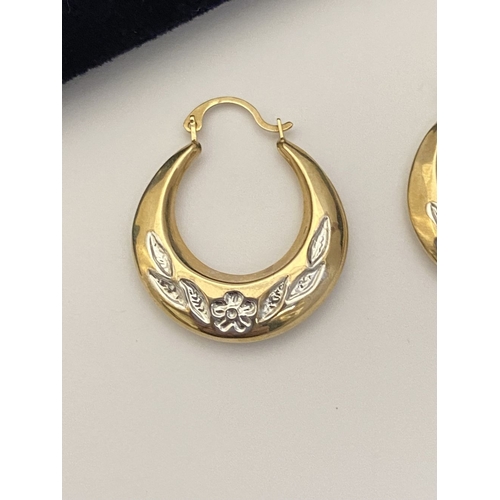 99 - A PAIR OF PRETTY 9CT GOLD HOOP EARRINGS, each hallmarked 375 to clasp, the hoops with nice engraved ... 