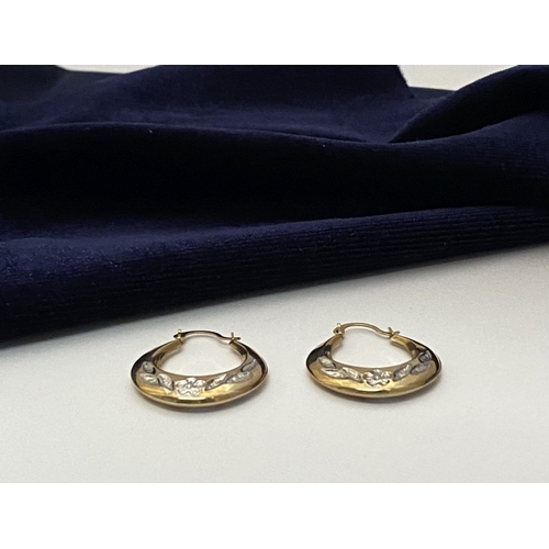 99 - A PAIR OF PRETTY 9CT GOLD HOOP EARRINGS, each hallmarked 375 to clasp, the hoops with nice engraved ... 