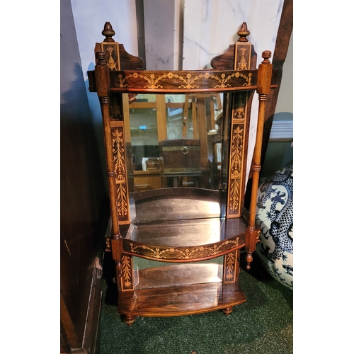 268 - A MAHOGANY INLAID MIRROR BACK WALL UNIT/SHELF, with intricate bow and swag, urn and foliate inlay to... 