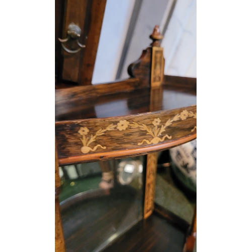 268 - A MAHOGANY INLAID MIRROR BACK WALL UNIT/SHELF, with intricate bow and swag, urn and foliate inlay to... 