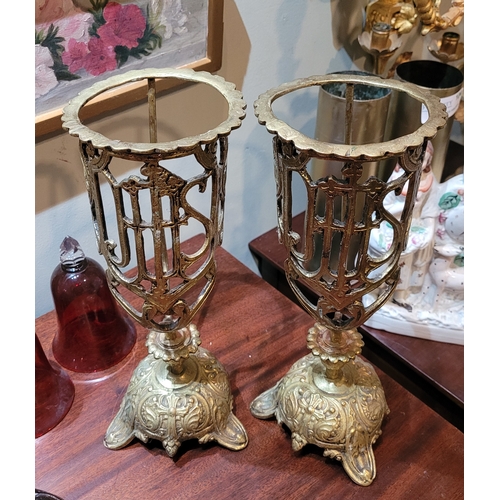 170 - A PAIR OF ANTIQUE ECCLESIATICAL CANDLE HOLDERS, highly decorative with scalloped border to top, the ... 