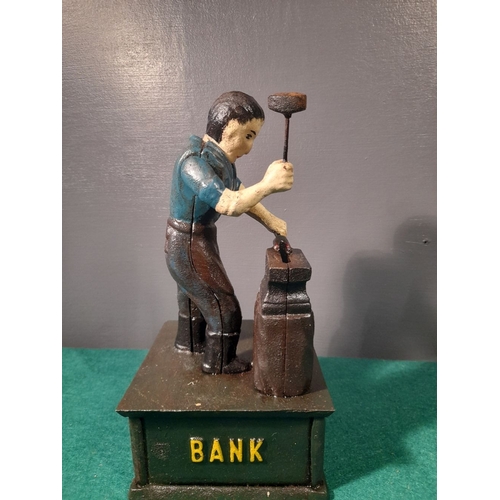 109 - A CAST IRON JOHN DEERE MECHANICAL MONEY BANK, in working order. Dimensions: 25cm high x 13cm wide x ... 