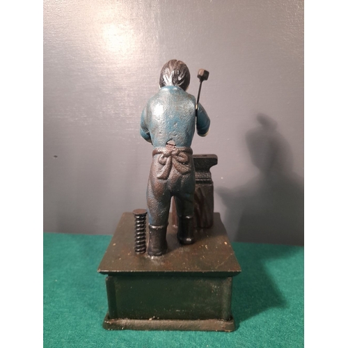 109 - A CAST IRON JOHN DEERE MECHANICAL MONEY BANK, in working order. Dimensions: 25cm high x 13cm wide x ... 