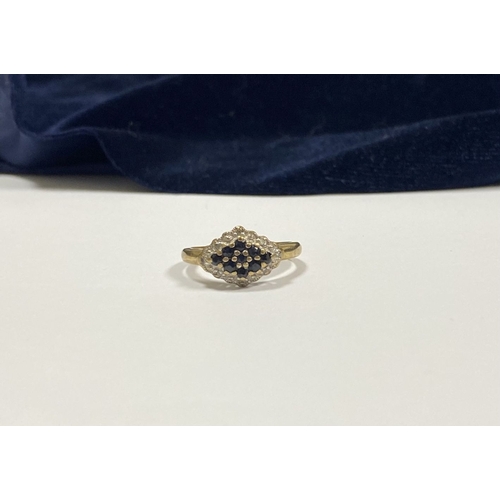 110 - A LOVELY ART DECO STYLE 9CT GOLD SAPPHIRE & DIAMOND CLUSTER RING, with central round cut sapphire su... 