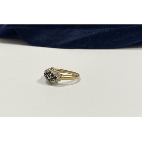 110 - A LOVELY ART DECO STYLE 9CT GOLD SAPPHIRE & DIAMOND CLUSTER RING, with central round cut sapphire su... 