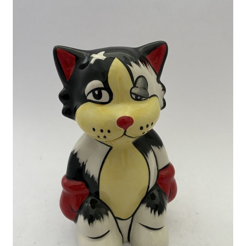 116 - A LORNA BAILY MODEL OF ‘ALI’ THE CAT, marked with artists name to base. Dimensions: 14cm high approx... 