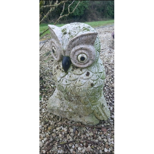 118 - A LARGE HEAVY GRANITE GARDEN ORNAMENT, in the form of an owl, highly detailed, the eyes and beak are... 