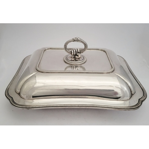 12 - AN EXCEPTIONAL PAIR OF GEORGE III IRISH SILVER ENTRÉE DISHES, the dish and lids with a scallop shape... 