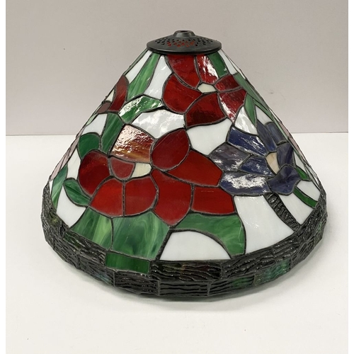 120 - A LARGE TIFFANY STYLE STAINED GLASS LAMPSHADE, floral design in vibrant colours with border to base,... 