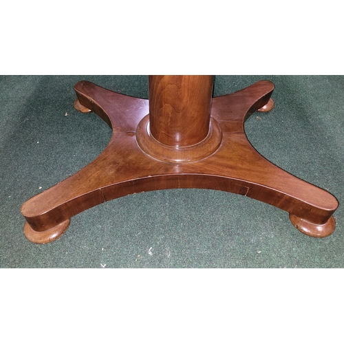 125 - A LARGE IRISH REGENCY MAHOGANY TIP-UP DINING TABLE, the table top made from two pieces of stunning m... 